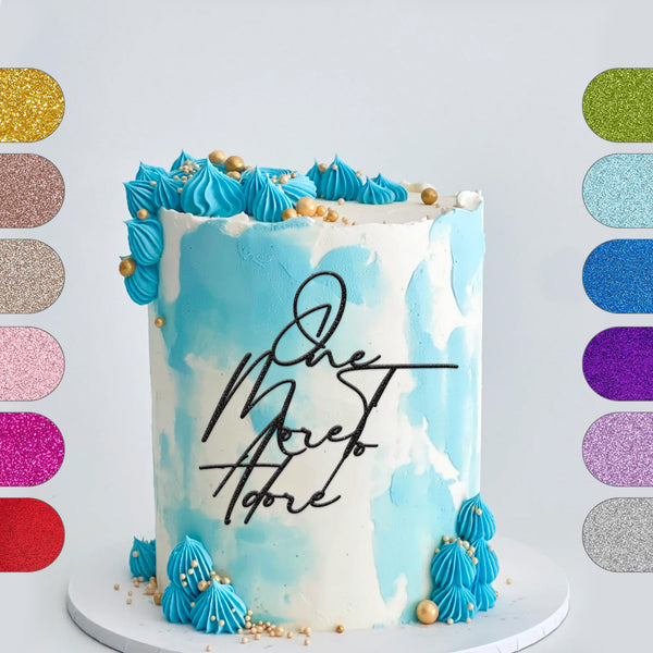 One More to Adore Script Baby Shower Cake Topper - hero