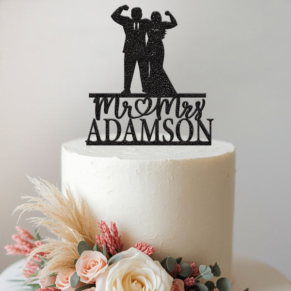 Personalised Flexing Fitness Couple Wedding Cake Topper – Surname in Black Glitter