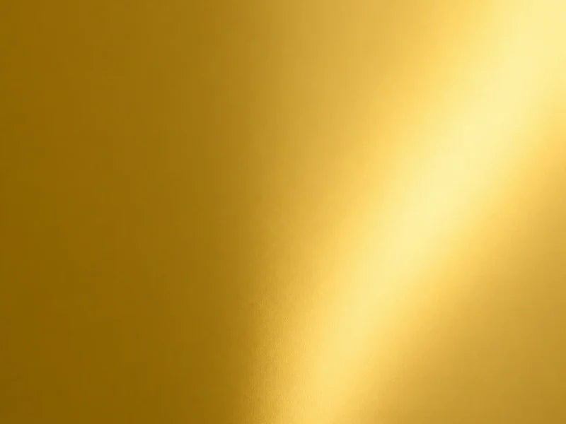 Close-up of the actual reflective gold mirror card texture